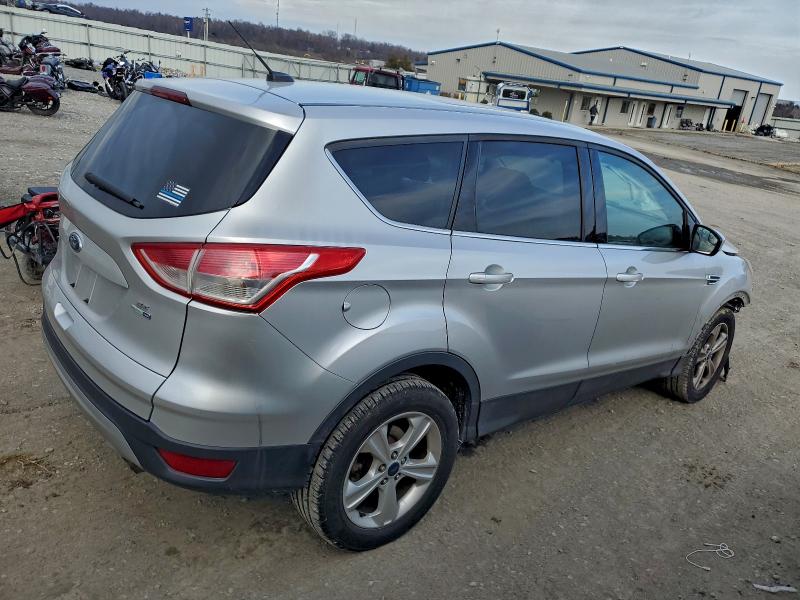 Photo 3 from auction – 2016 FORD ESCAPE SE with VIN 1FMCU9GX0GUA74381