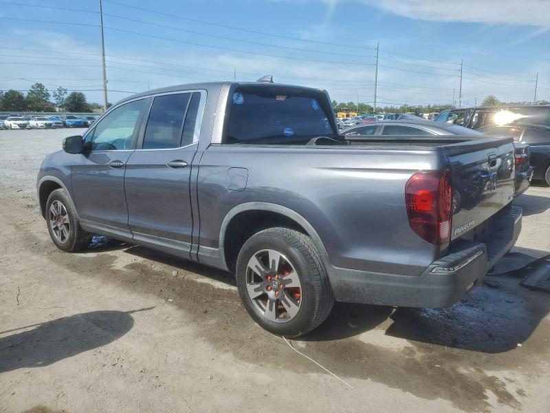 Photo 2 from auction – 2017 HONDA RIDGELINE with VIN 5FPYK3F57HB023037