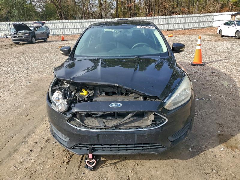 Photo 5 from auction – 2016 FORD FOCUS SE with VIN 1FADP3F27GL261051