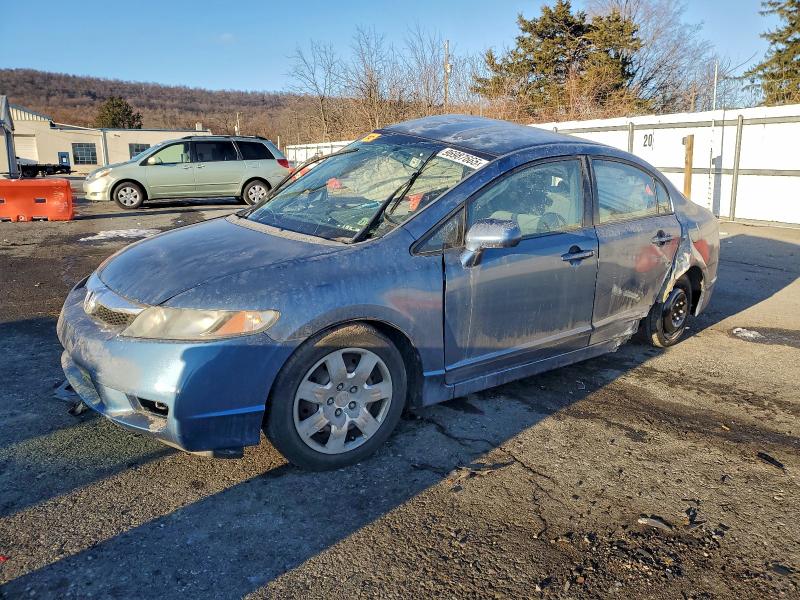 HONDA CIVIC LX 2011 with VIN 2HGFA1F56BH547094 - Photo from auction