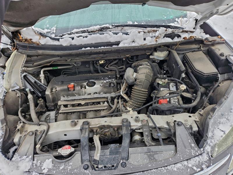 Photo 12 from auction – 2014 HONDA CR-V with VIN 2HKRM4H34EH722602