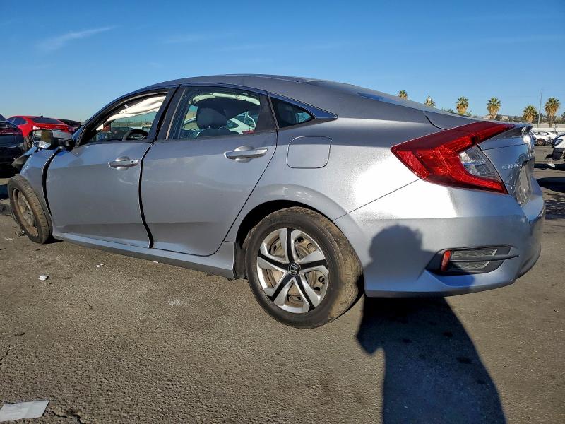 Photo 2 from auction – 2018 HONDA CIVIC LX with VIN 2HGFC2F56JH577971