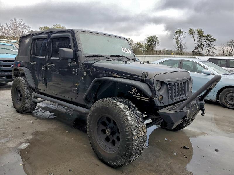 Photo 4 from auction – 2016 JEEP WRANGLER U with VIN 1C4BJWDG6GL150672