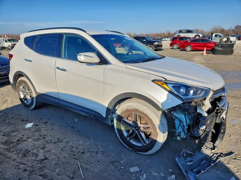 Photo 4 from auction – 2017 HYUNDAI SANTA FE S with VIN 5NMZU3LB5HH042685