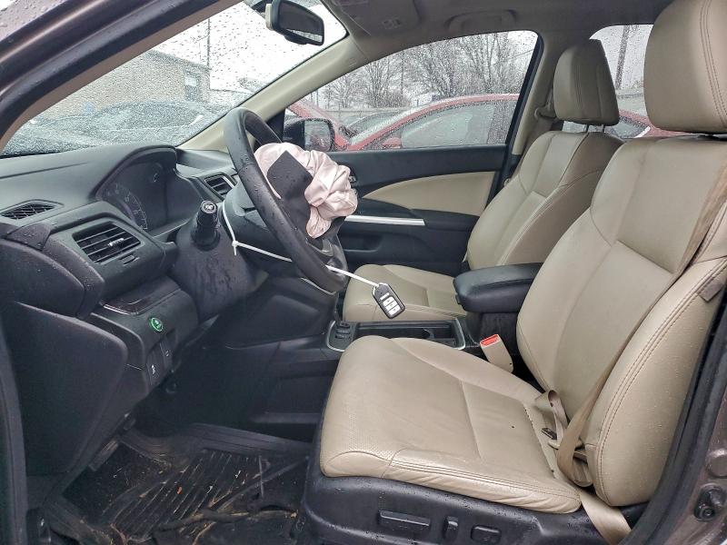 Photo 7 from auction – 2016 HONDA CR-V with VIN 2HKRM3H74GH502229