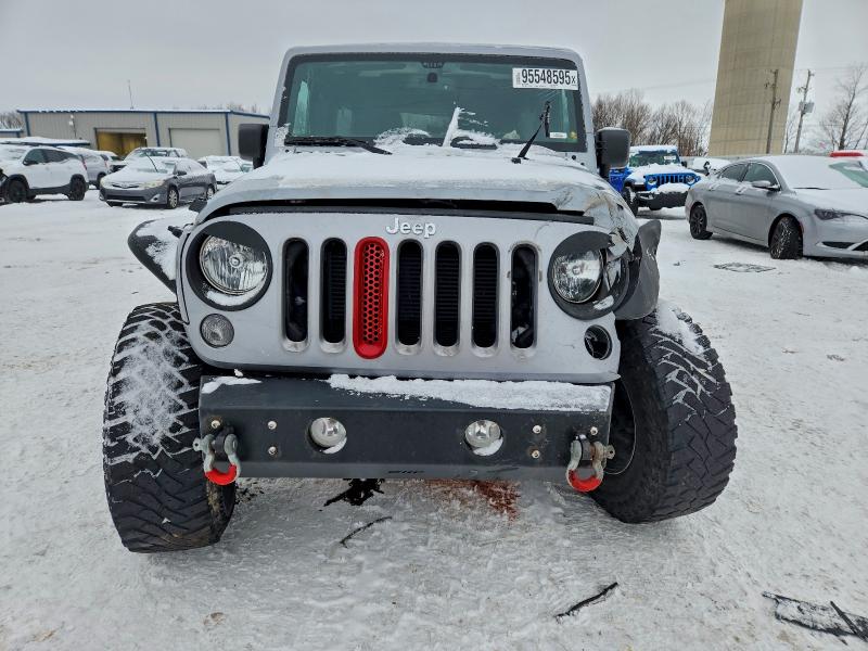 Photo 5 from auction – 2015 JEEP WRANGLER U with VIN 1C4BJWDG7FL560976