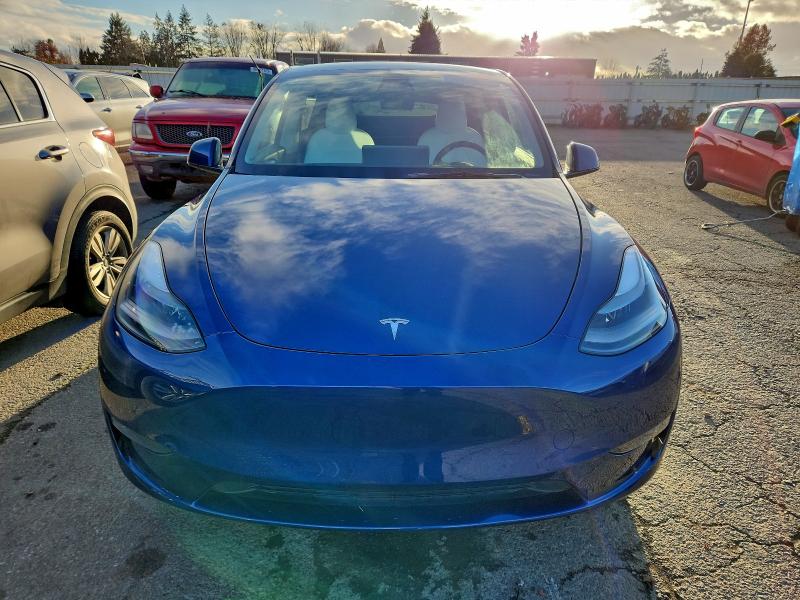 Photo 5 from auction – 2023 TESLA MODEL Y with VIN 7SAYGDEE9PF670946