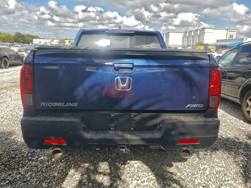 Photo 6 from auction – 2022 HONDA RIDGELINE with VIN 5FPYK3F76NB009532
