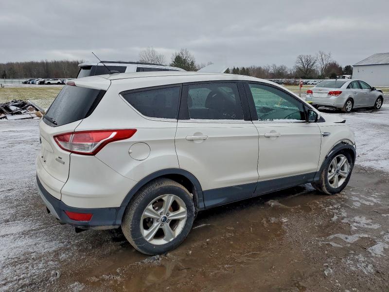 Photo 3 from auction – 2016 FORD ESCAPE SE with VIN 1FMCU0G92GUB05062