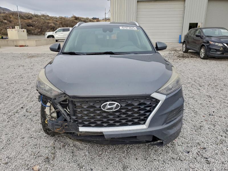 Photo 5 from auction – 2019 HYUNDAI TUCSON LIM with VIN KM8J3CA48KU004674
