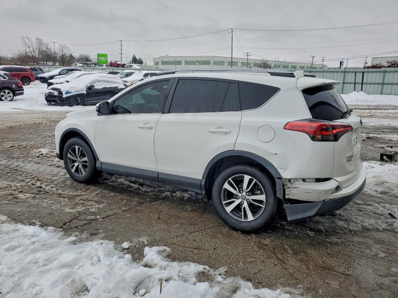 Photo 2 from auction – 2017 TOYOTA RAV4 XLE with VIN 2T3RFREV8HW551590