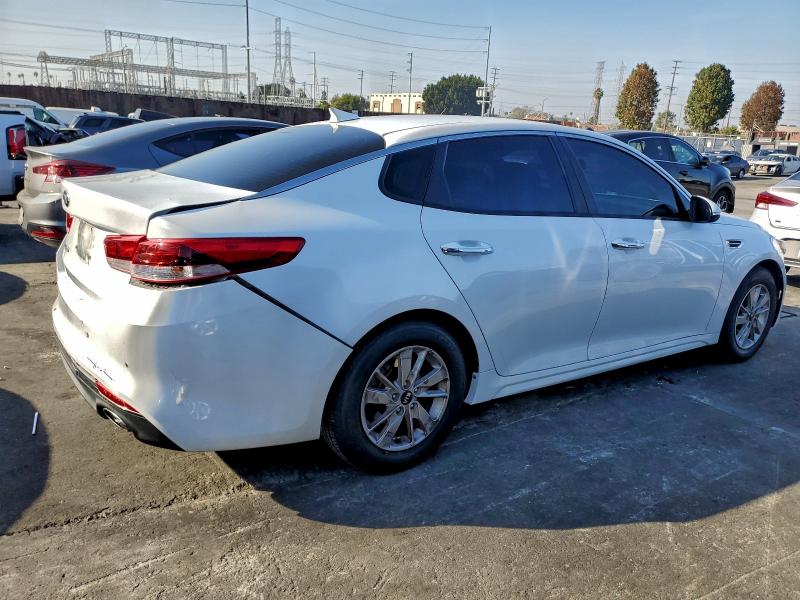Photo 3 from auction – 2018 KIA OPTIMA LX with VIN 5XXGT4L33JG206237