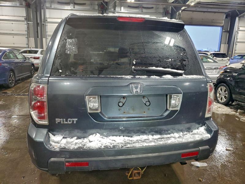 Photo 6 from auction – 2006 HONDA PILOT LX with VIN 5FNYF28136B022577