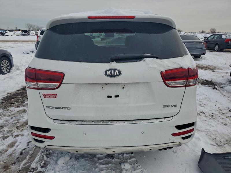 Photo 6 from auction – 2016 KIA SORENTO SX with VIN 5XYPKDA50GG015449