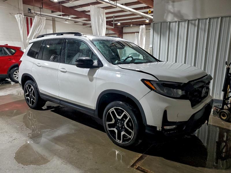 Photo 4 from auction – 2023 HONDA PASSPORT with VIN 5FNYF8H06PB004148
