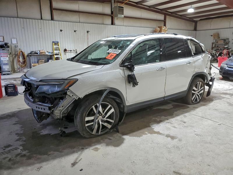 HONDA PILOT ELIT 2016 with VIN 5FNYF6H07GB128109 - Photo from auction
