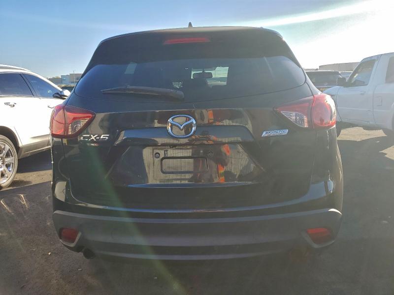 Photo 6 from auction – 2014 MAZDA CX-5 TOURI with VIN JM3KE2CYXE0356610