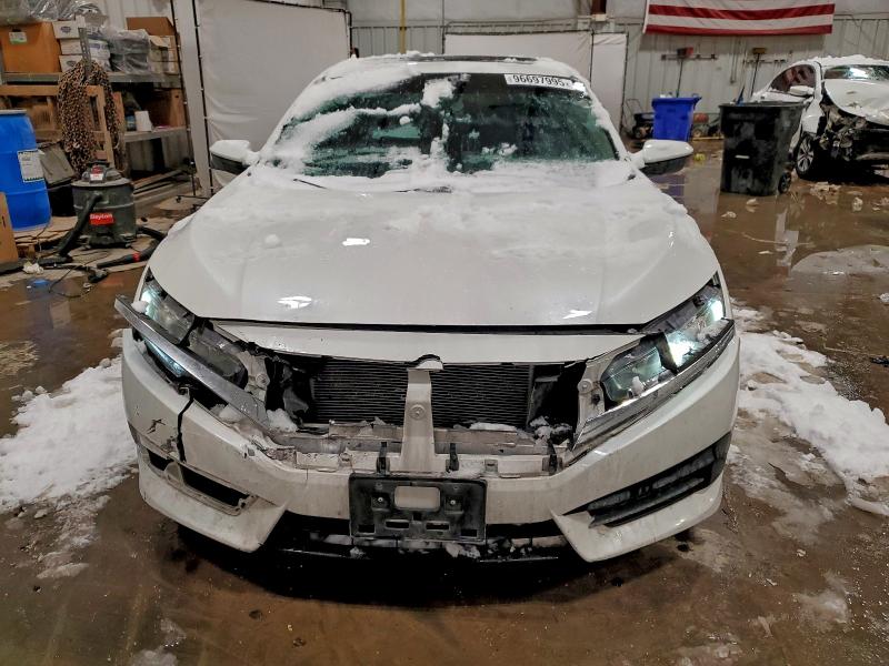 Photo 5 from auction – 2017 HONDA CIVIC EX with VIN 19XFC2F73HE033224