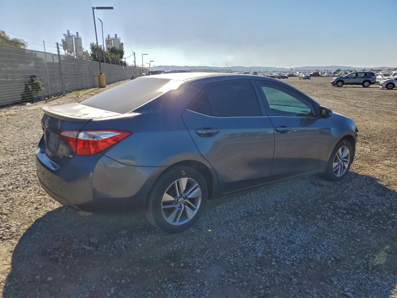 Photo 3 from auction – 2014 TOYOTA COROLLA EC with VIN 5YFBPRHE8EP156874