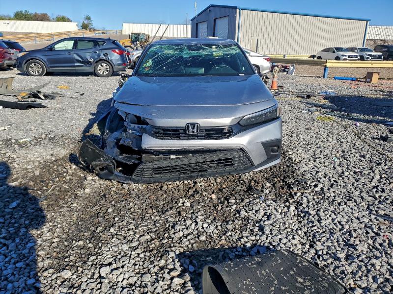 Photo 5 from auction – 2023 HONDA CIVIC SPOR with VIN 2HGFE2F56PH572255
