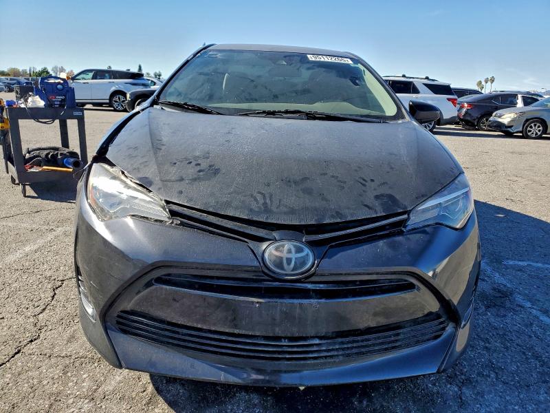 Photo 5 from auction – 2017 TOYOTA COROLLA L with VIN 5YFBURHE2HP715851
