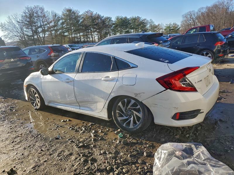 Photo 2 from auction – 2017 HONDA CIVIC EX with VIN 2HGFC2F72HH559334