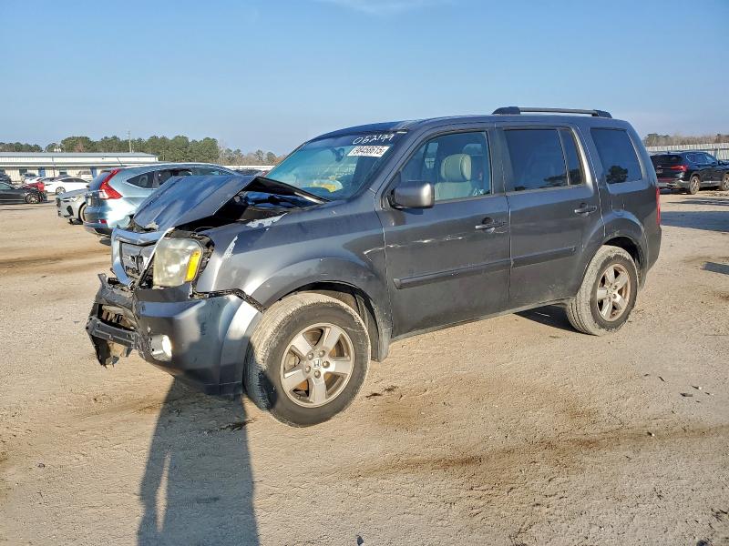 HONDA PILOT EXL 2011 with VIN 5FNYF3H6XBB052199 - Photo from auction