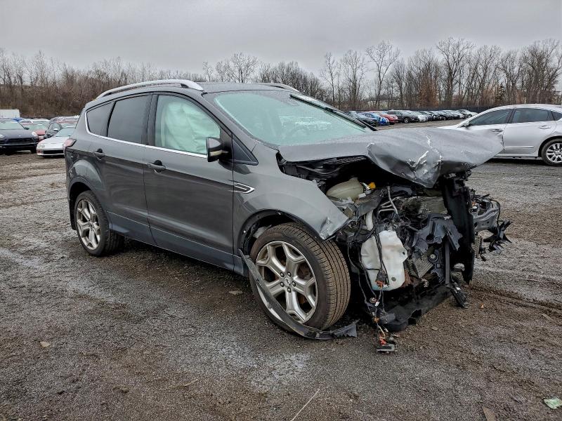 Photo 4 from auction – 2017 FORD ESCAPE TIT with VIN 1FMCU9J90HUC70784