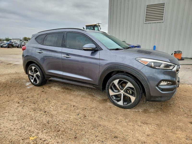 Photo 4 from auction – 2016 HYUNDAI TUCSON LIM with VIN KM8J33A29GU104630