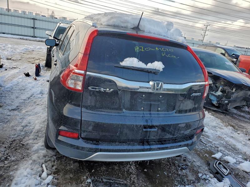 Photo 6 from auction – 2016 HONDA CR-V EXL with VIN 5J6RM4H71GL104990
