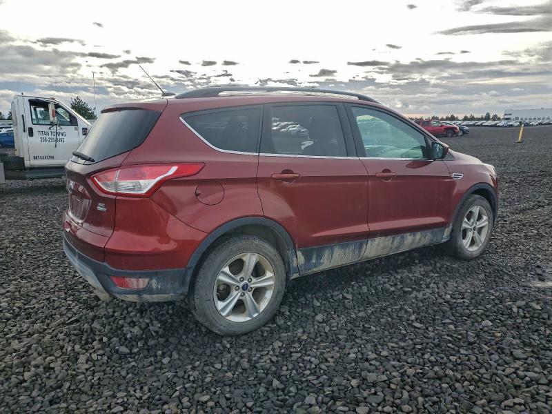 Photo 3 from auction – 2014 FORD ESCAPE SE with VIN 1FMCU9GXXEUB85274