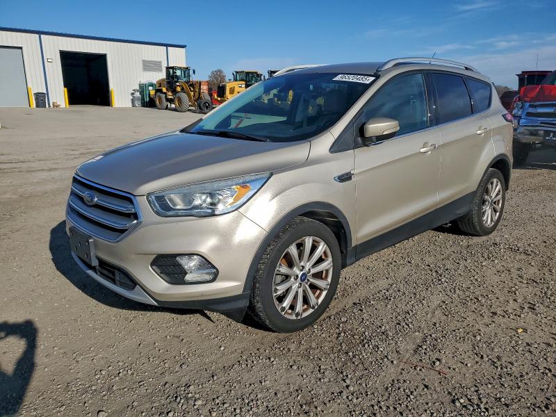 FORD ESCAPE TIT 2017 with VIN 1FMCU0JD7HUB86512 - Photo from auction