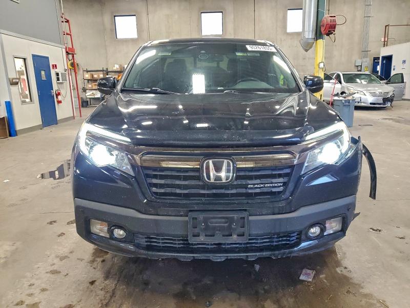 Photo 5 from auction – 2017 HONDA RIDGELINE with VIN 5FPYK3F86HB030622