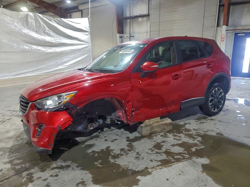 MAZDA CX-5 GT 2016 with VIN JM3KE4DY3G0679698 - Photo from auction