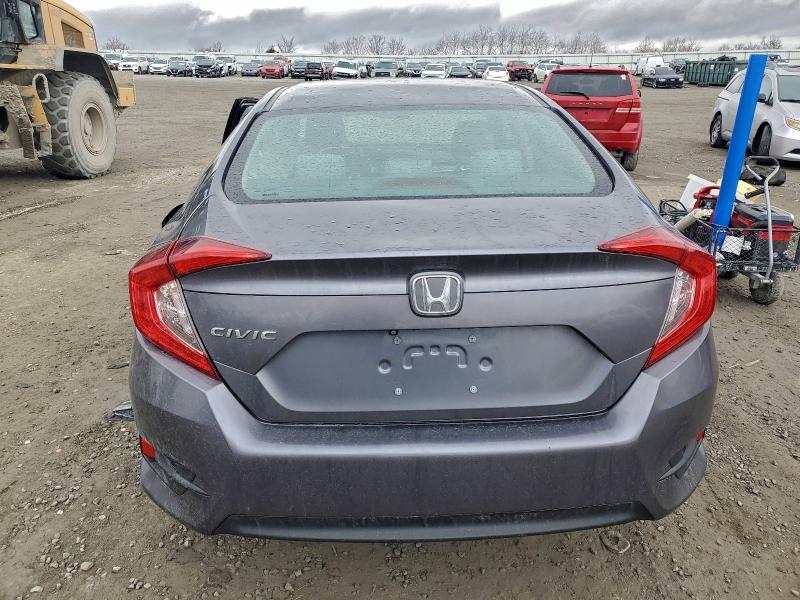 Photo 6 from auction – 2017 HONDA CIVIC LX with VIN 2HGFC2F50HH545155