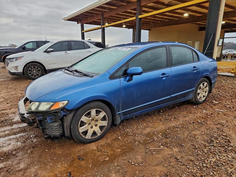 HONDA CIVIC LX 2011 with VIN 19XFA1F56BE012731 - Photo from auction