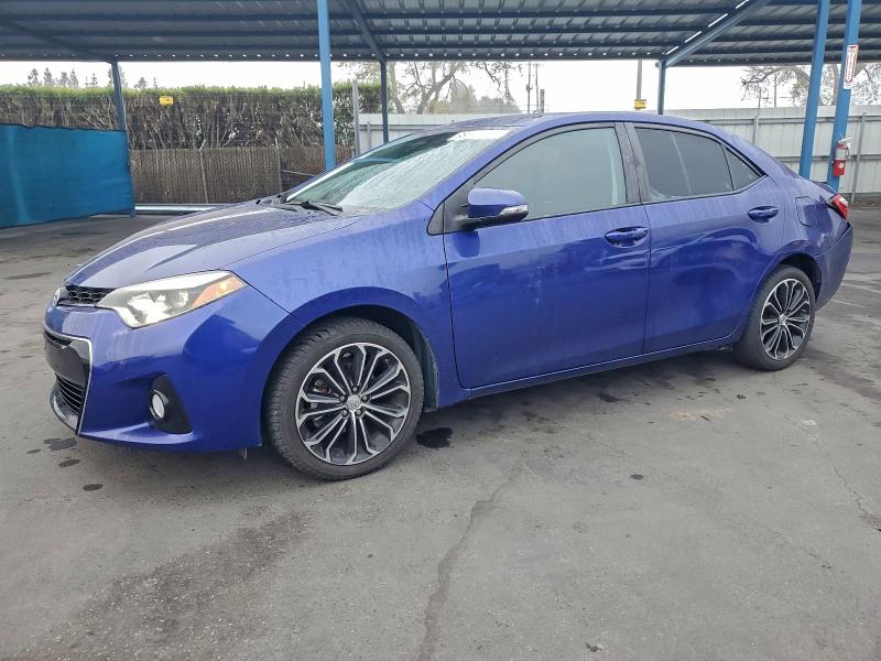 TOYOTA COROLLA L 2014 con VIN 5YFBURHEXEP085430 - Foto de la subasta
