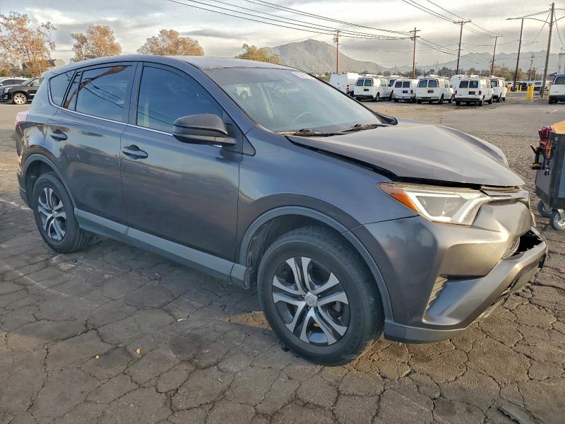 Photo 4 from auction – 2018 TOYOTA RAV4 LE with VIN JTMZFREV7JJ194293