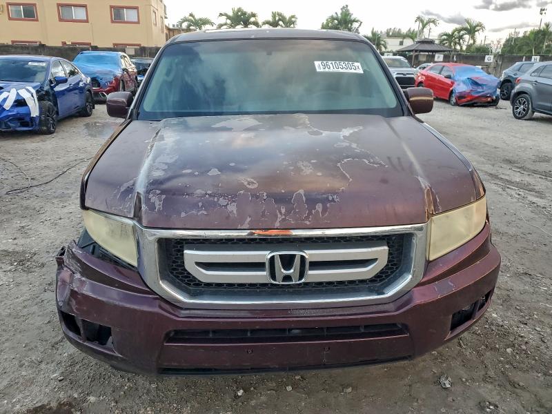 Photo 5 from auction – 2011 HONDA RIDGELINE with VIN 5FPYK1F50BB005796