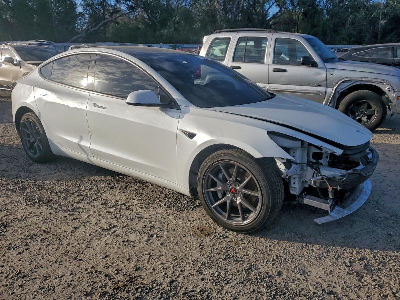Photo 4 from auction – 2022 TESLA MODEL 3 with VIN 5YJ3E1EB8NF105098