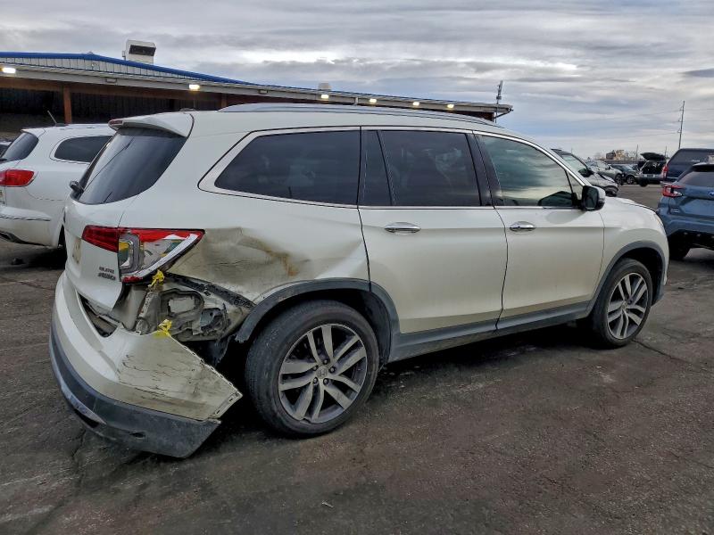 Photo 3 from auction – 2017 HONDA PILOT ELIT with VIN 5FNYF6H04HB053435