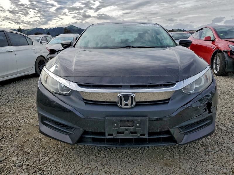 Фото 5 с аукциона – 2016 HONDA CIVIC LX с VIN 19XFC2F55GE245622