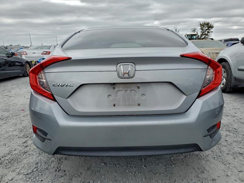 Photo 6 from auction – 2017 HONDA CIVIC LX with VIN 2HGFC2F56HH564891