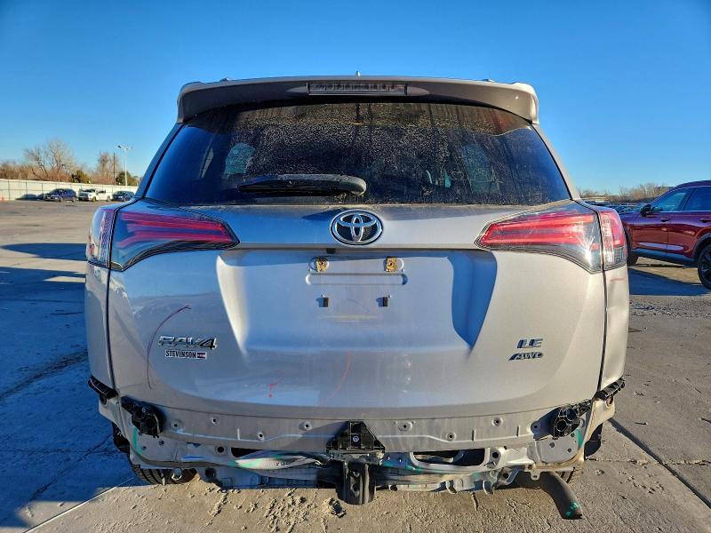 Photo 6 from auction – 2017 TOYOTA RAV4 LE with VIN 2T3BFREV7HW665551