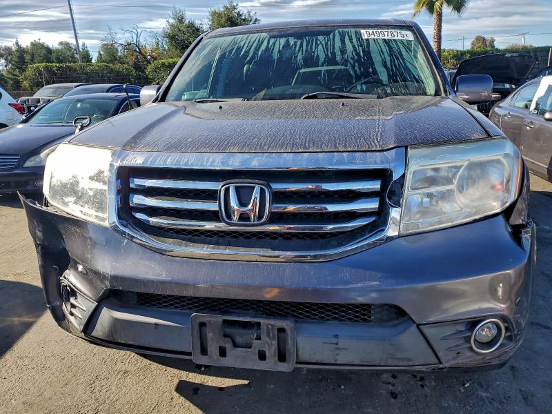 Photo 5 from auction – 2015 HONDA PILOT TOUR with VIN 5FNYF4H96FB063870