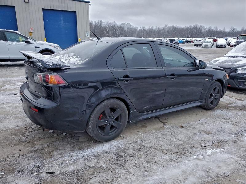 Photo 3 from auction – 2014 MITSUBISHI LANCER SE with VIN JA32V2FW6EU007907