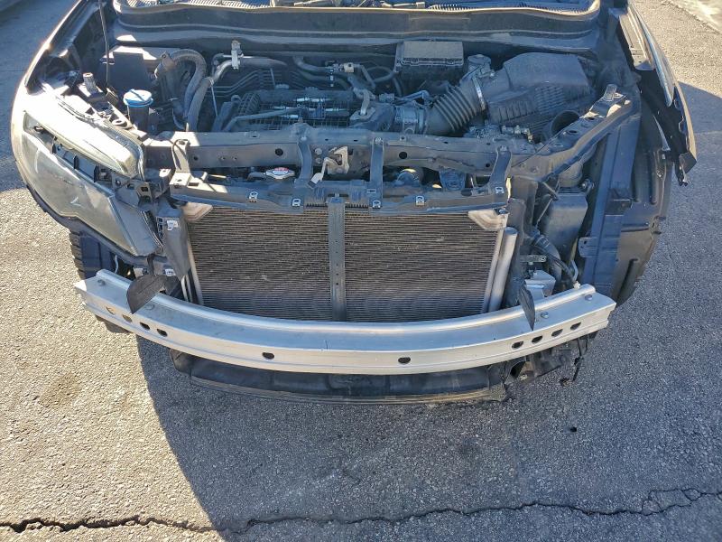 Photo 11 from auction – 2018 HONDA RIDGELINE with VIN 5FPYK3F16JB000142