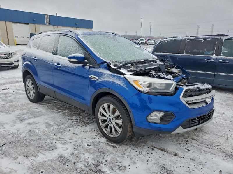 Photo 4 from auction – 2018 FORD ESCAPE TIT with VIN 1FMCU9J92JUC33483