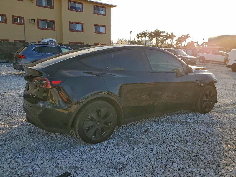 Photo 3 from auction – 2023 TESLA MODEL Y with VIN 7SAYGDEE1PA058608