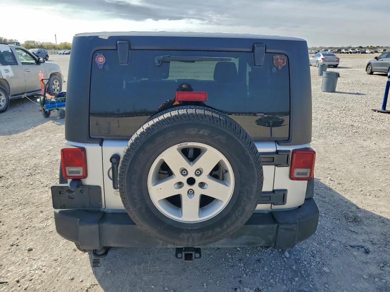 Photo 6 from auction – 2011 JEEP WRANGLER S with VIN 1J4GA2D18BL503524